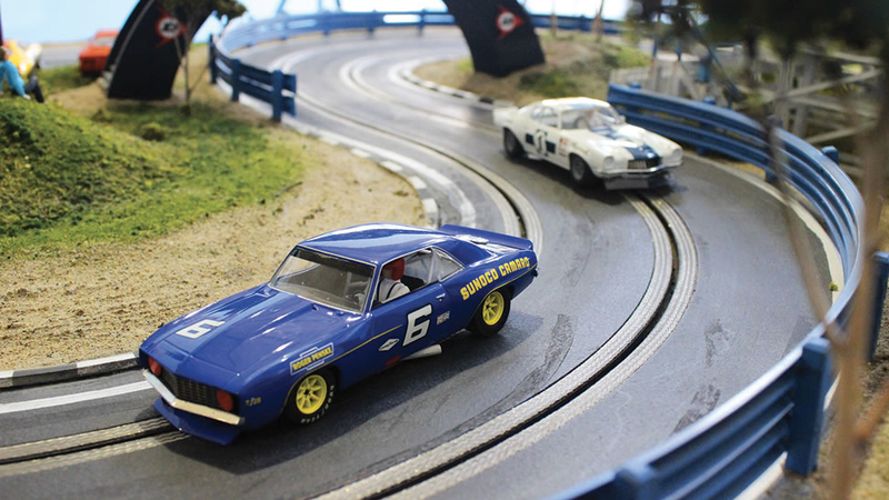 Illustration for article titled A 1969 Camaro Z/28 Reborn as an Incredibly Detailed Slot Car Track